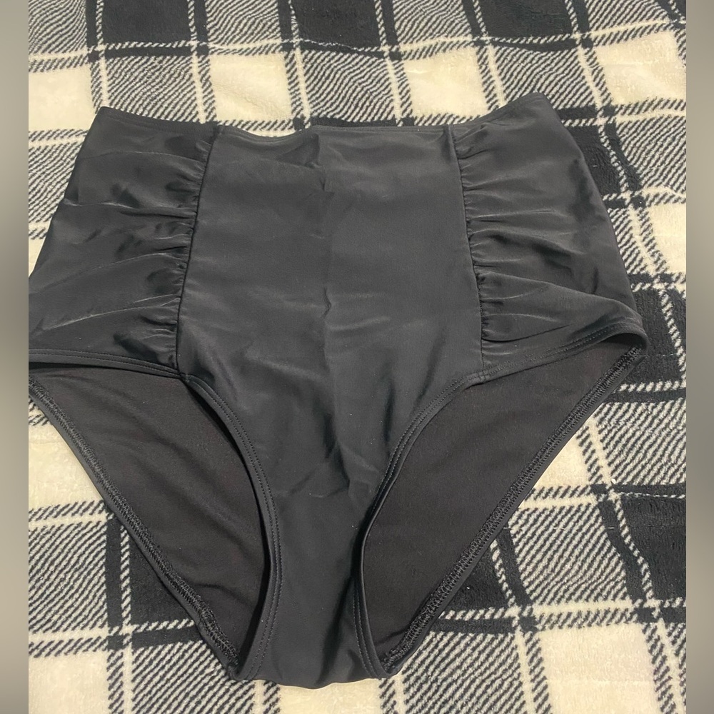 Women’s black swim suit bottoms